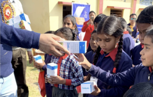 Supply of Multi-vitamins syrup is given to children